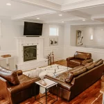 Home design trends present in this room with textured ceilings and comfortable furniture and more